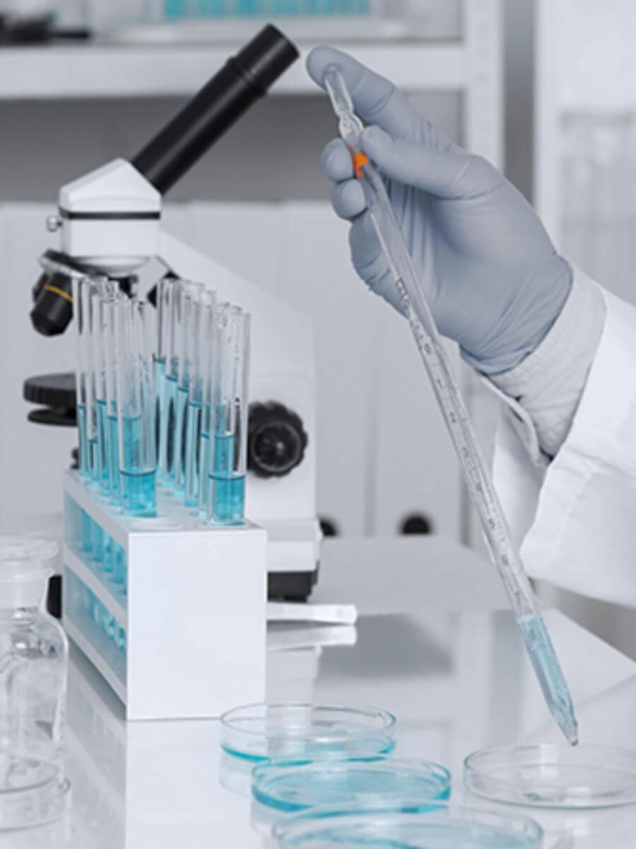 Man lab working with Microscope