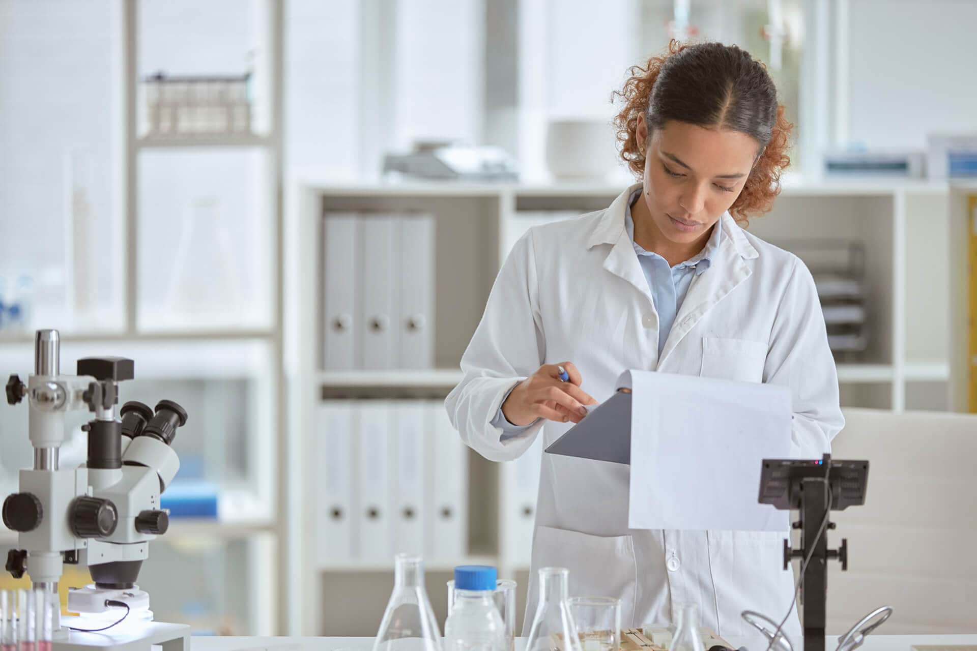 Scientist taking notes