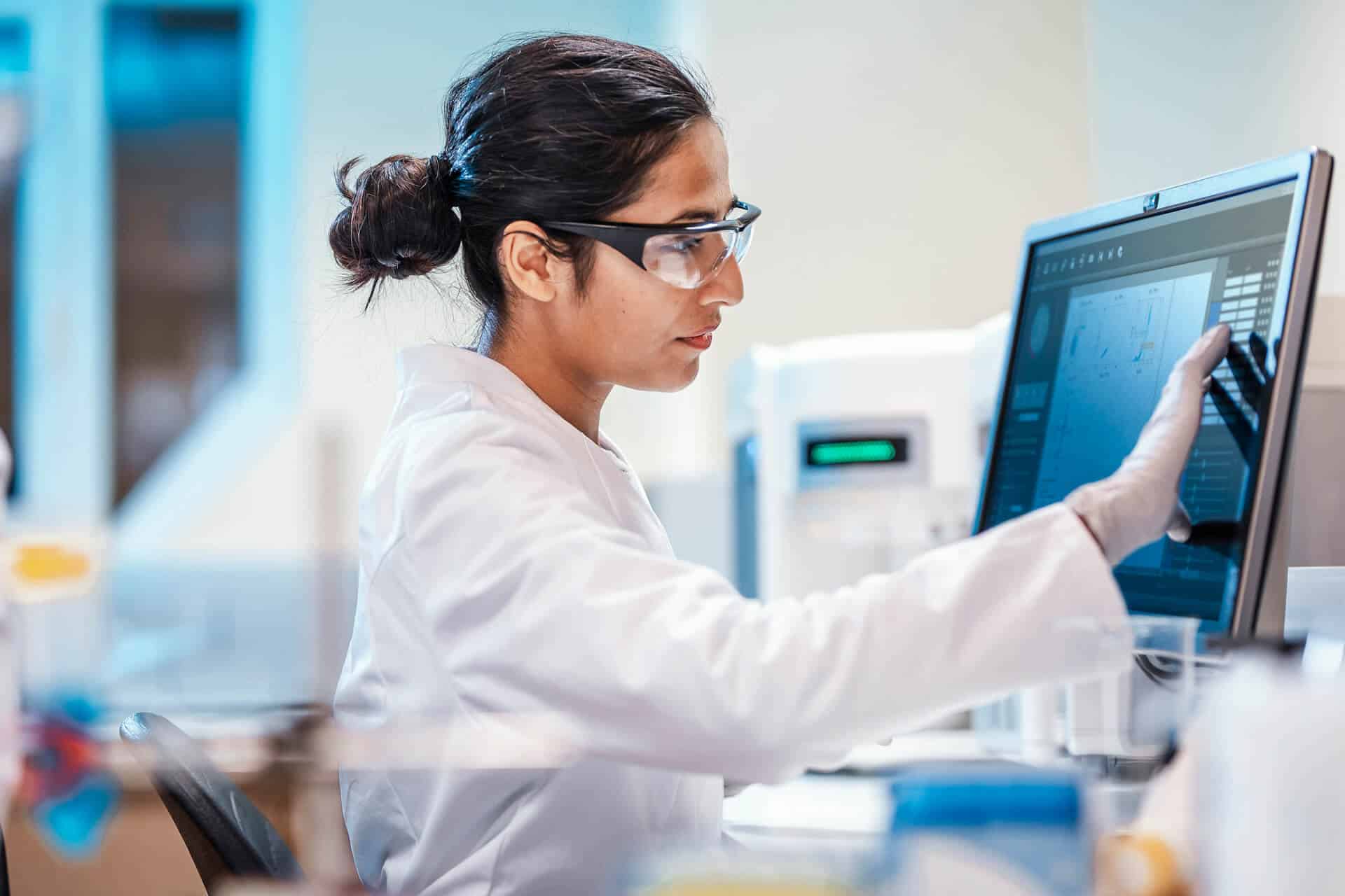Scientist using touchscreen