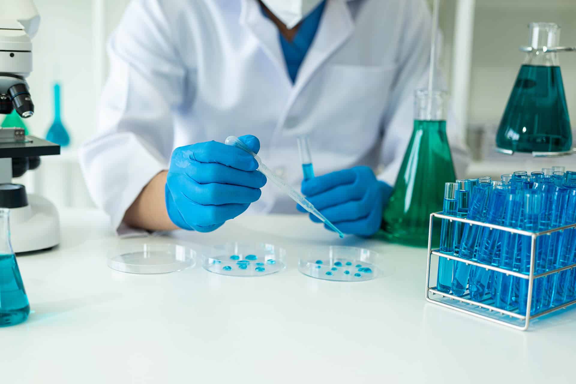Lab technician pipetting samples
